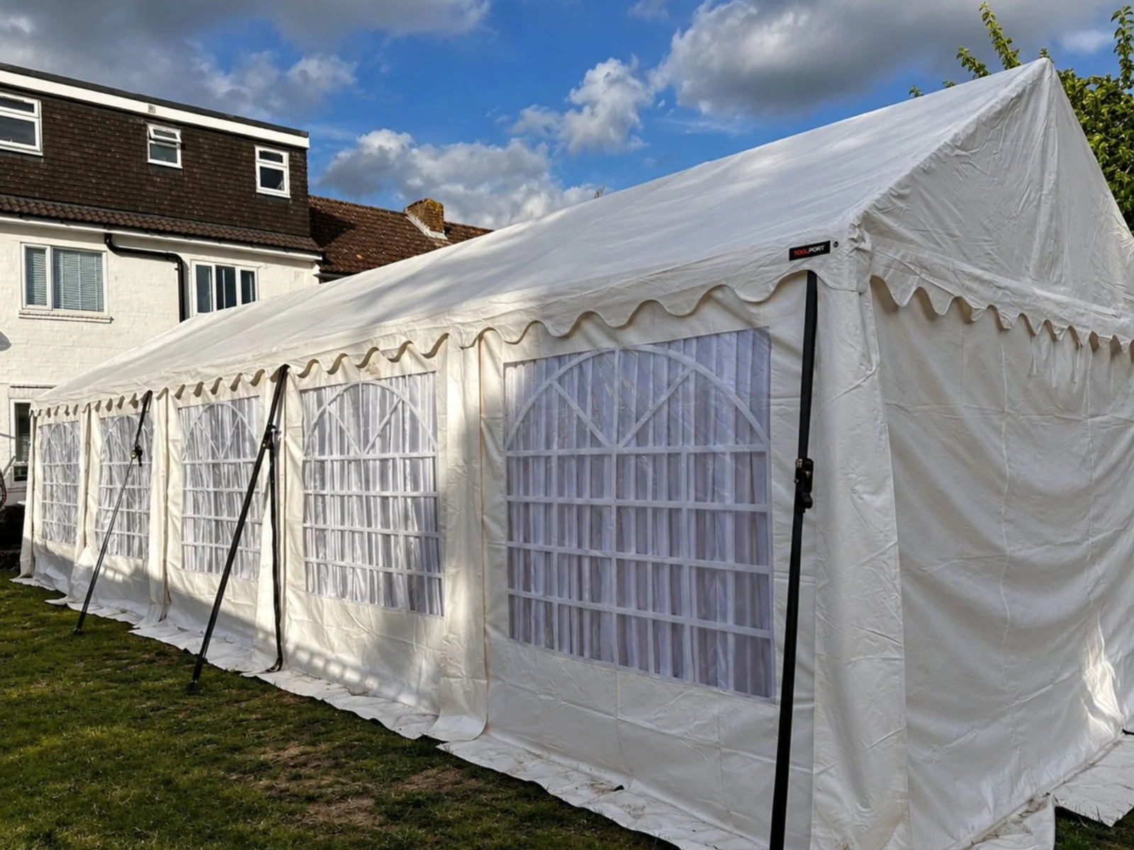 White marquee in the owner-supplied Grand Hire Herts media handoff.